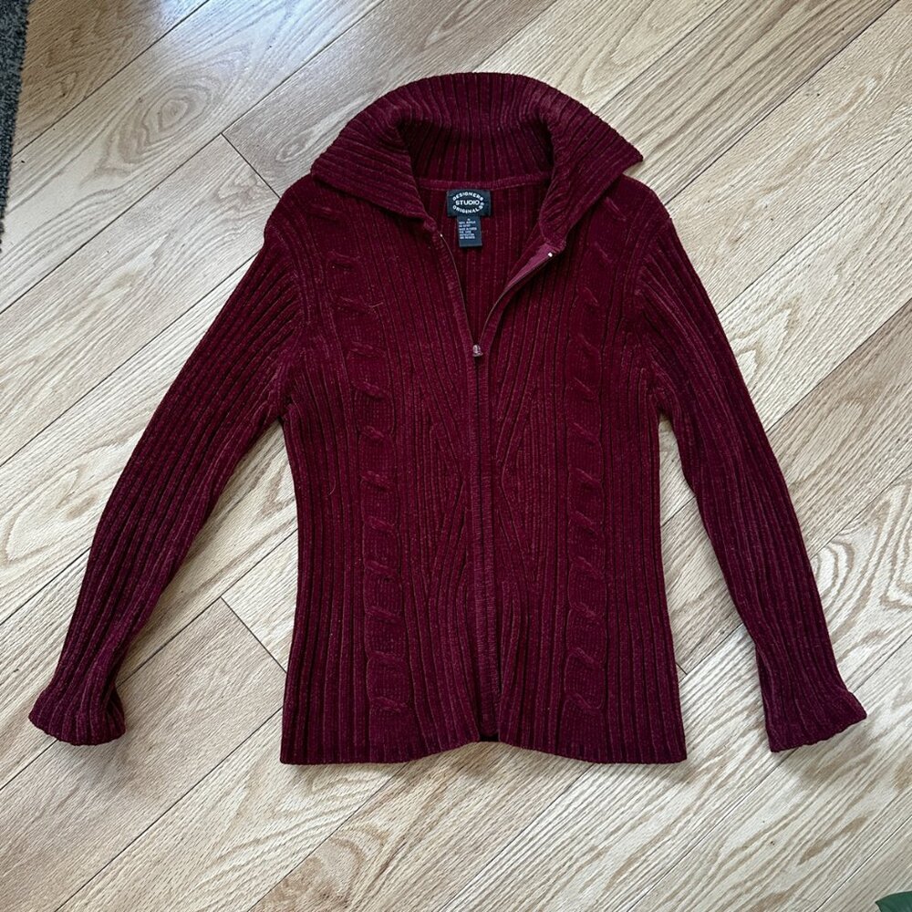 Burgundy cardigan sweater with long sleeves, collar & zipper front closure